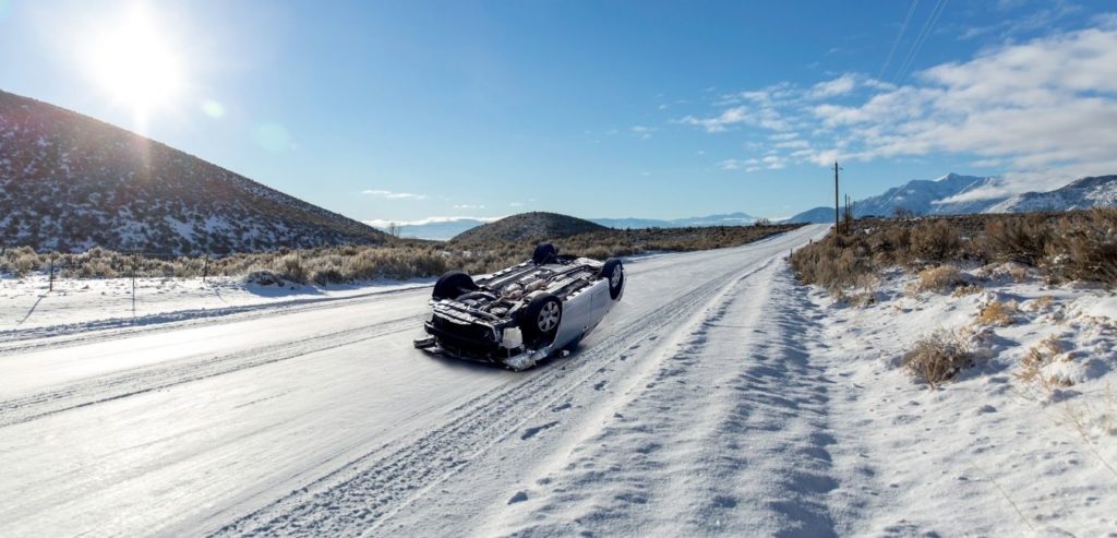 Auto Rollover on Snowy Road