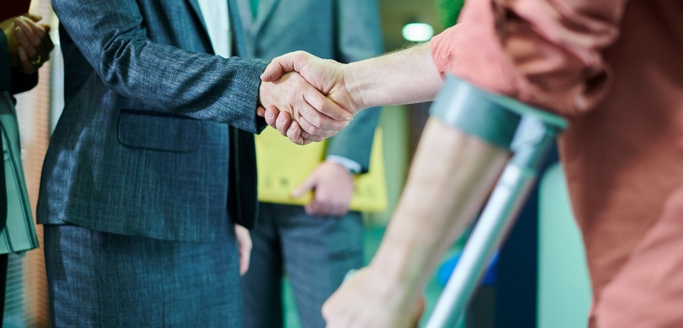 Personal Injury Attorney shaking hands with client