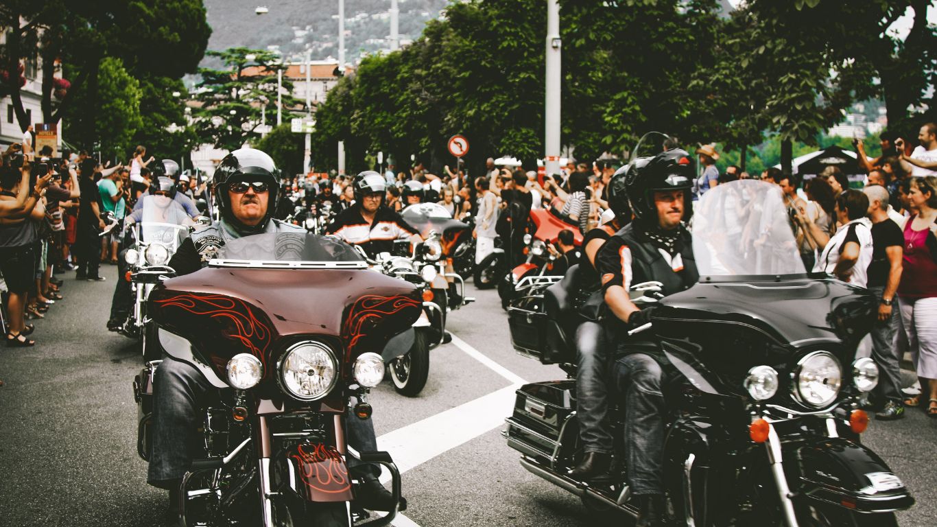 a parade of riders at a motorcycle rally