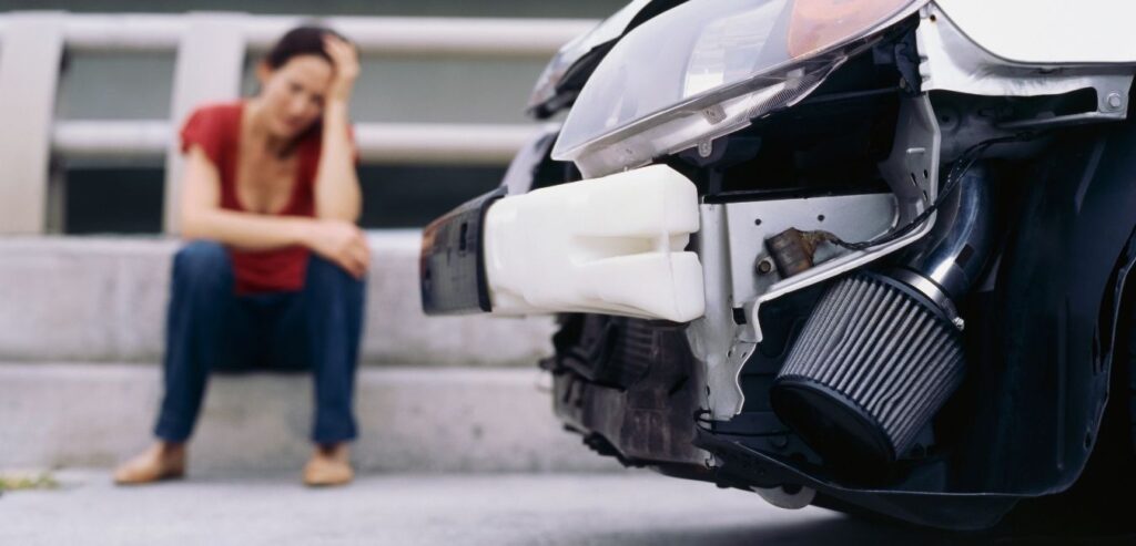 Low angle view of the front part of a car after an accident